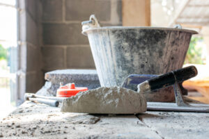 Worksite with bucket and tools