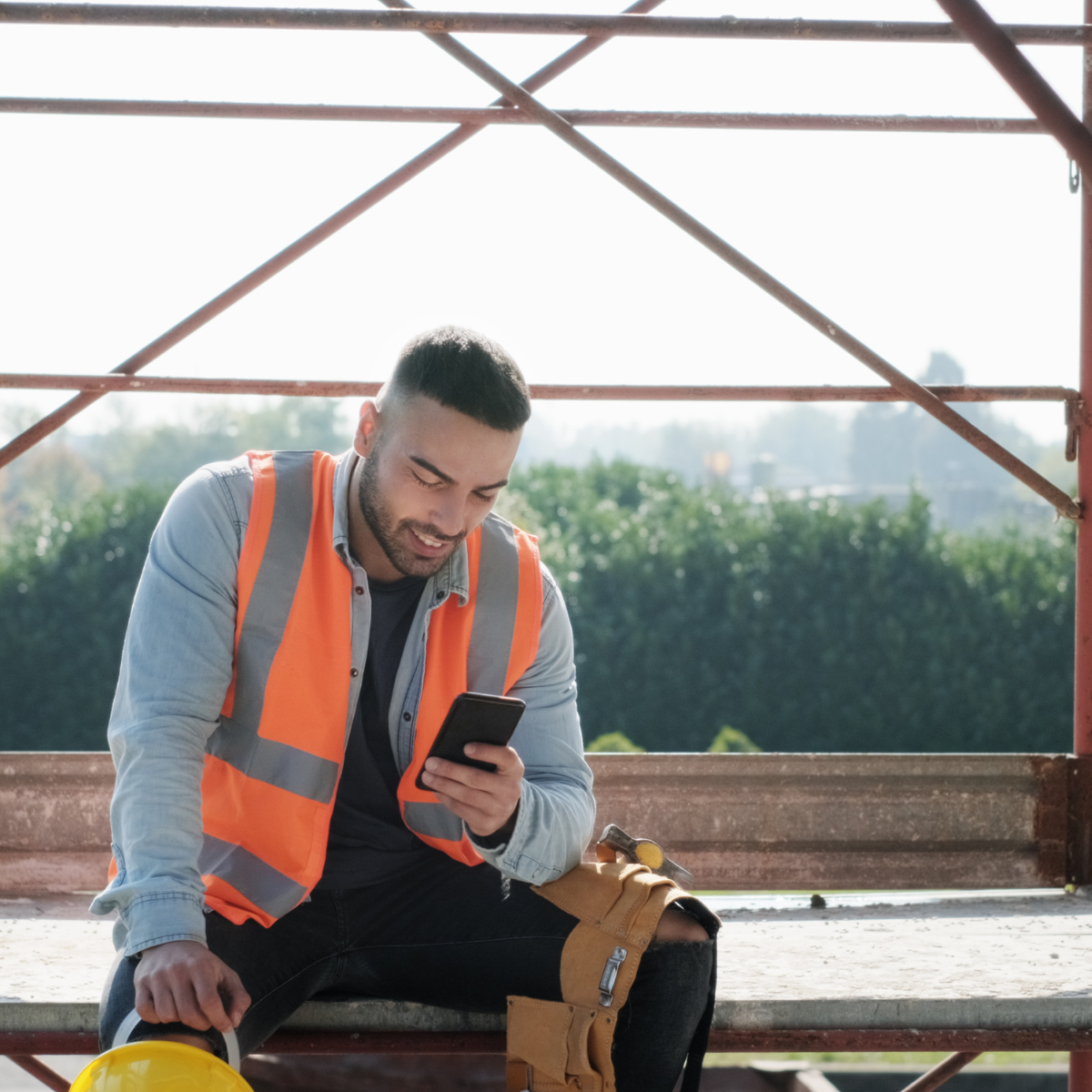 Man using digital H&S system on his phone
